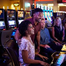 Filipino player watching a live dealer baccarat table on a mobile phone